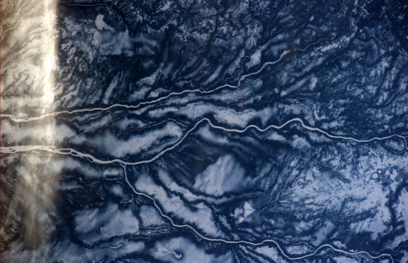 The earth in the lens astronaut Paolo Nespoli