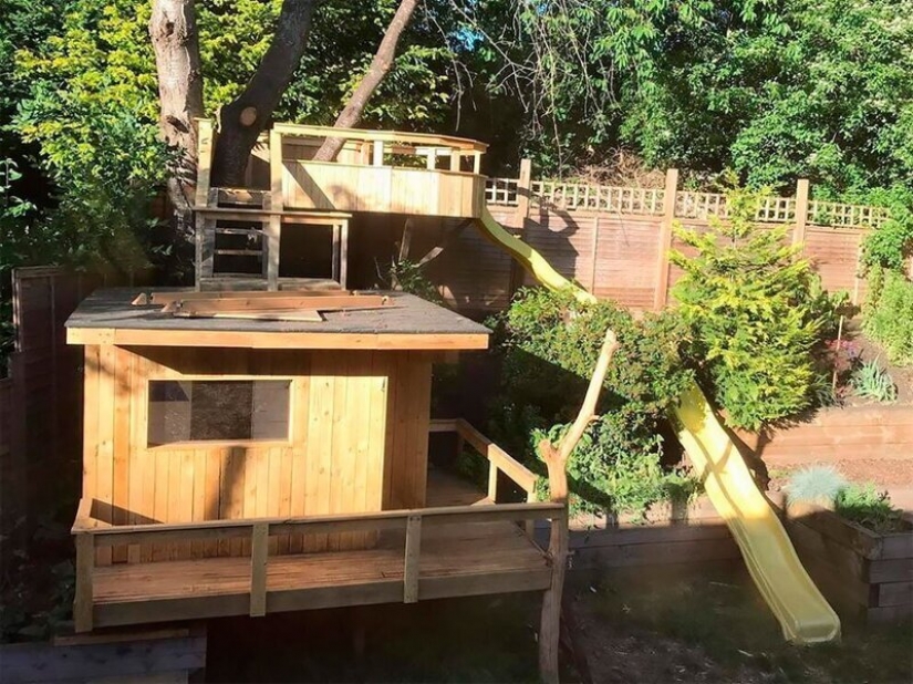 A mi hija le encantó! La casa del árbol de tablas viejas, que fue construido por un padre que cuida
