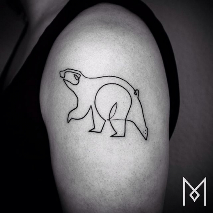 Cool minimalist tattoo, drawn with a single line Cool minimalist tattoo, drawn with a single line