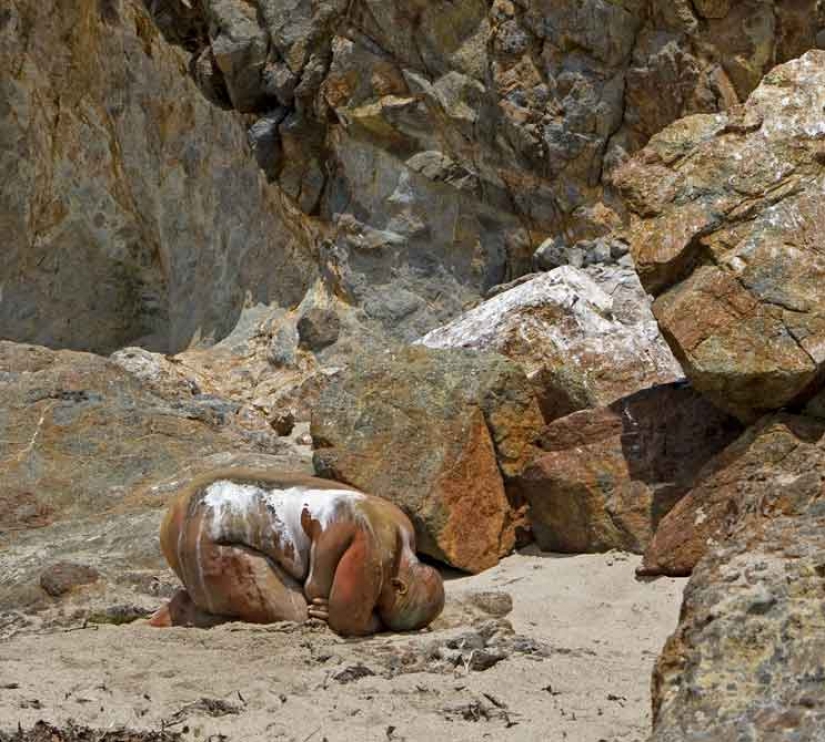 Look for the woman: naked models blend in with the scenery
