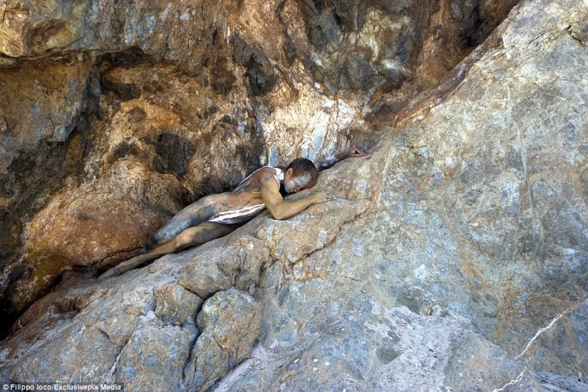 Look for the woman: naked models blend in with the scenery