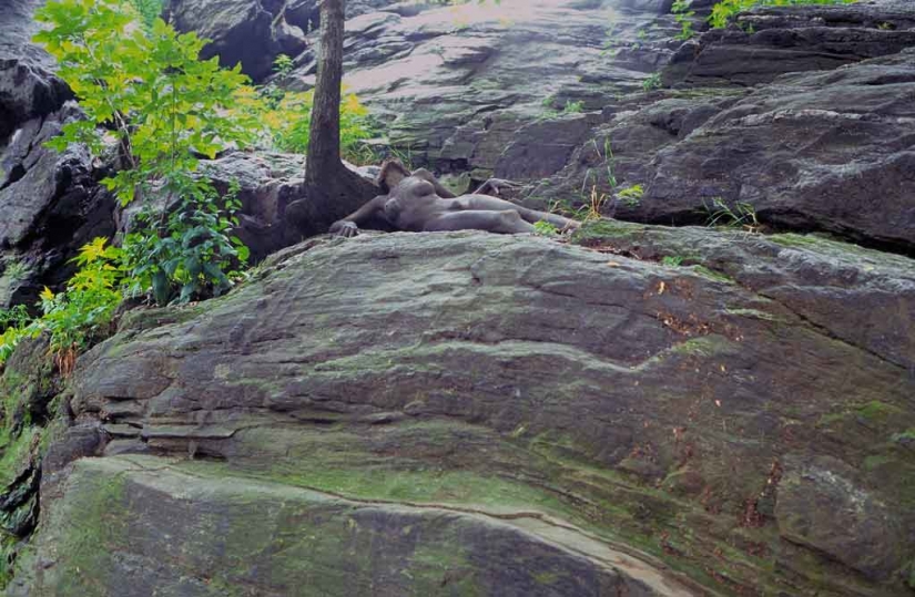 Look for the woman: naked models blend in with the scenery