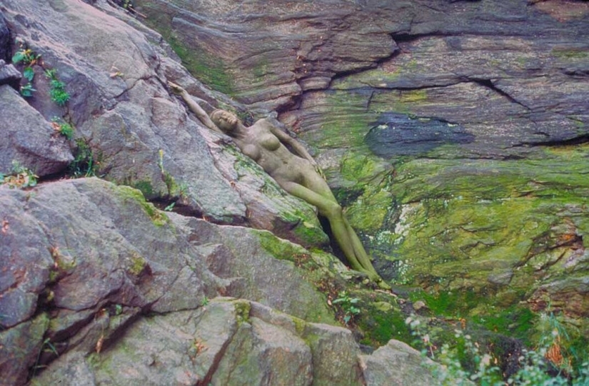 Look for the woman: naked models blend in with the scenery