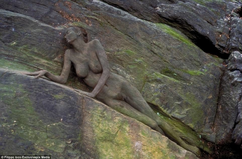 Look for the woman: naked models blend in with the scenery