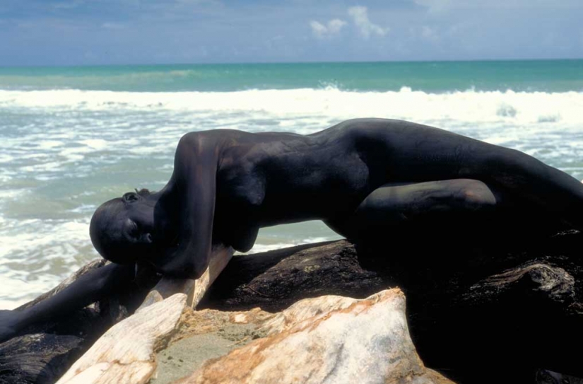 Look for the woman: naked models blend in with the scenery