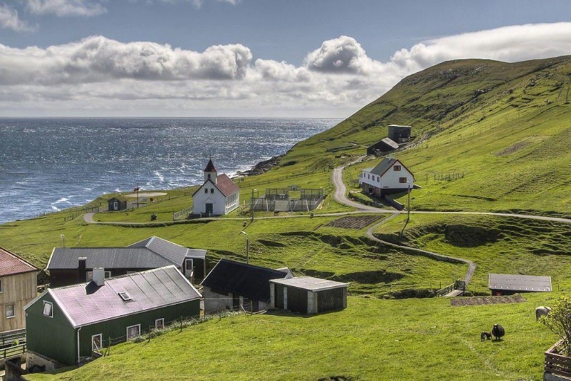 The picturesque village of Gasadalur is the most beautiful place of Faroe Islands