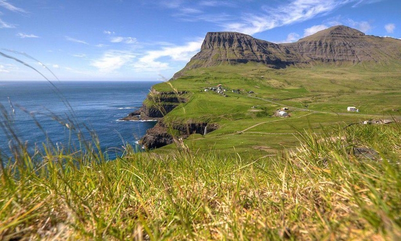 The picturesque village of Gasadalur is the most beautiful place of Faroe Islands