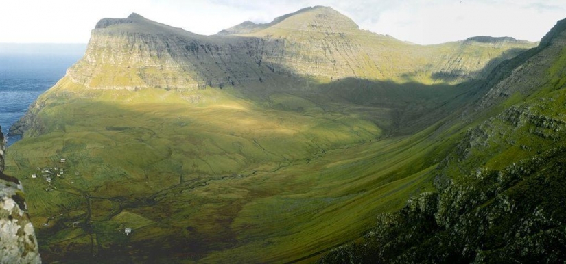 The picturesque village of Gasadalur is the most beautiful place of Faroe Islands