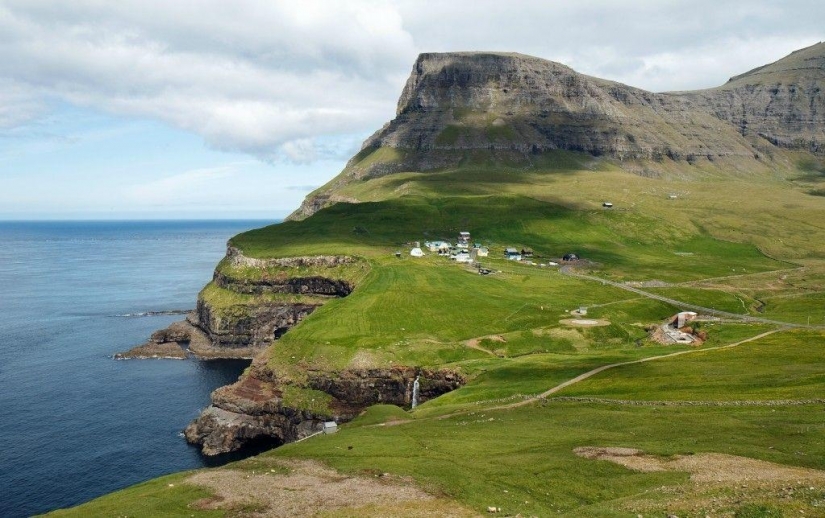 The picturesque village of Gasadalur is the most beautiful place of Faroe Islands