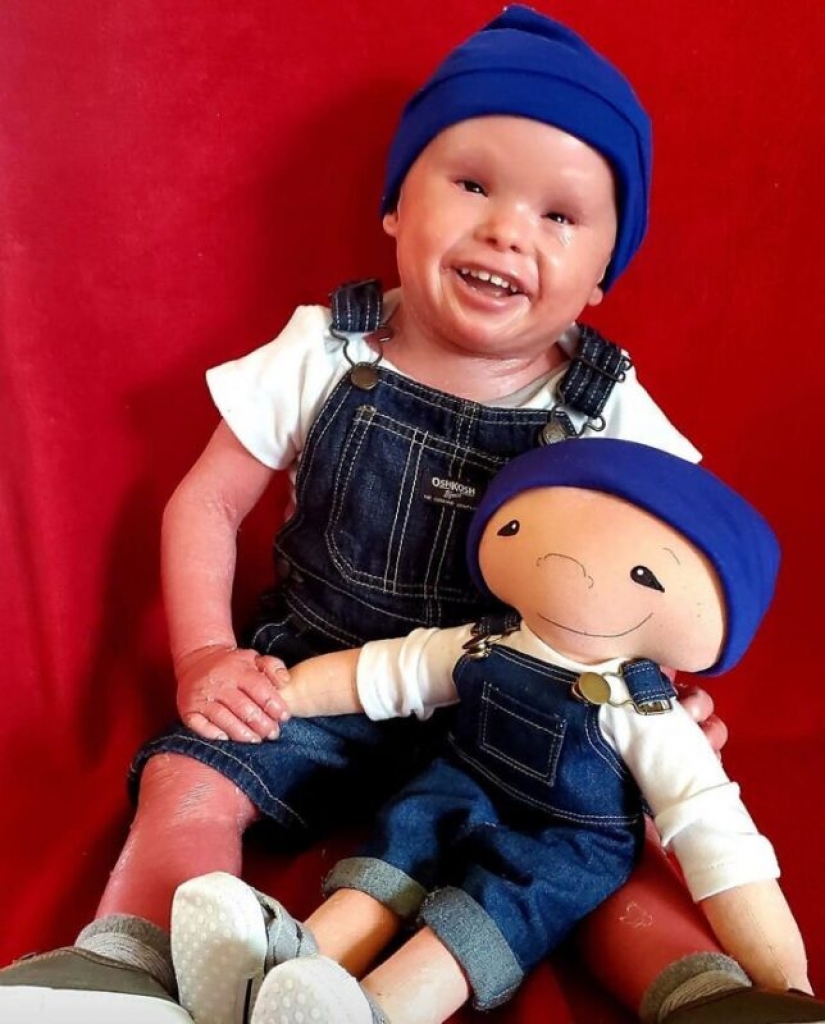 Woman sews a special doll for children with disabilities