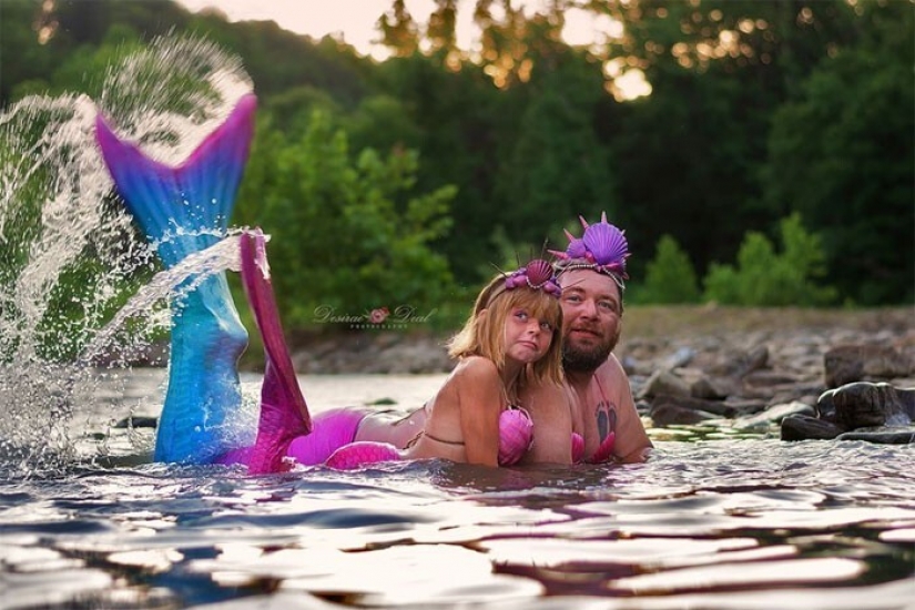 A photo shoot of a father with a little daughter in the image of mermaids conquered social networks
