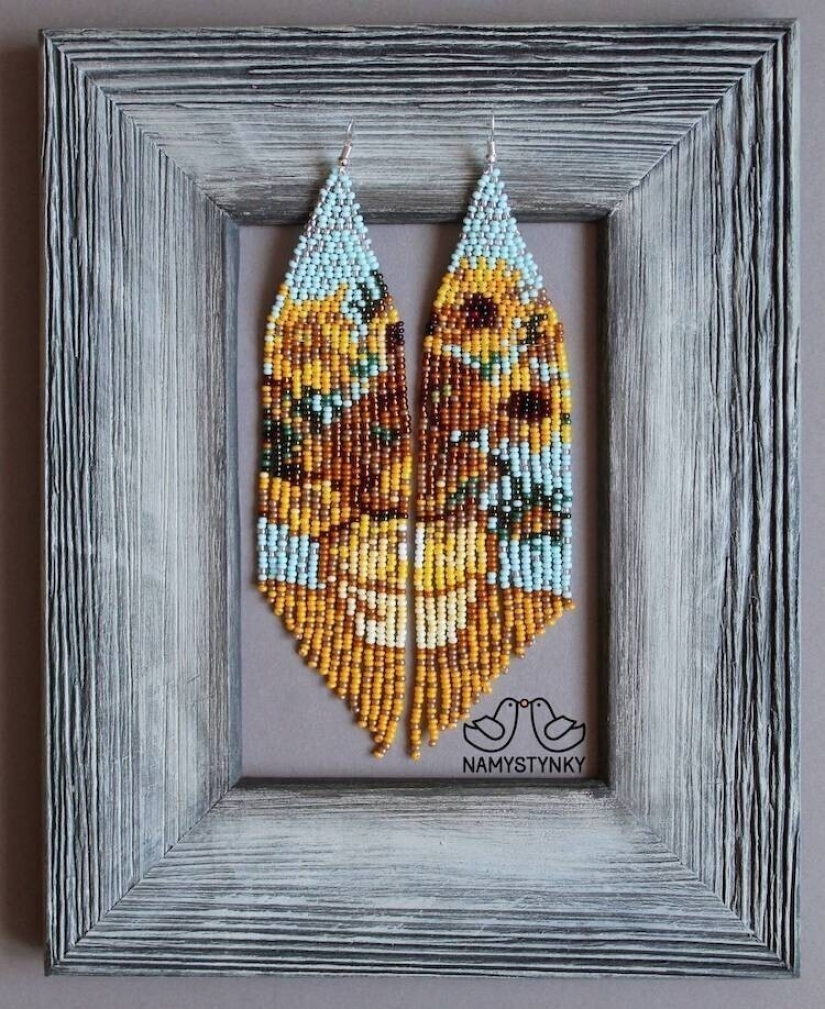 A talented Ukrainian woman makes beaded earrings based on the plots of famous paintings