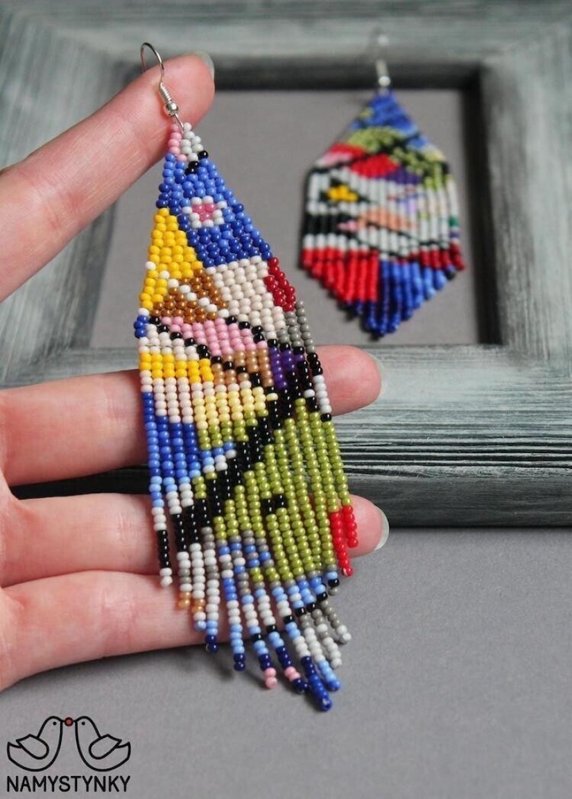 A talented Ukrainian woman makes beaded earrings based on the plots of famous paintings