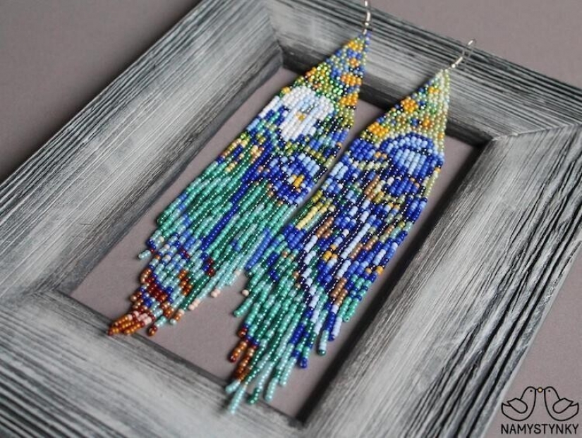 A talented Ukrainian woman makes beaded earrings based on the plots of famous paintings