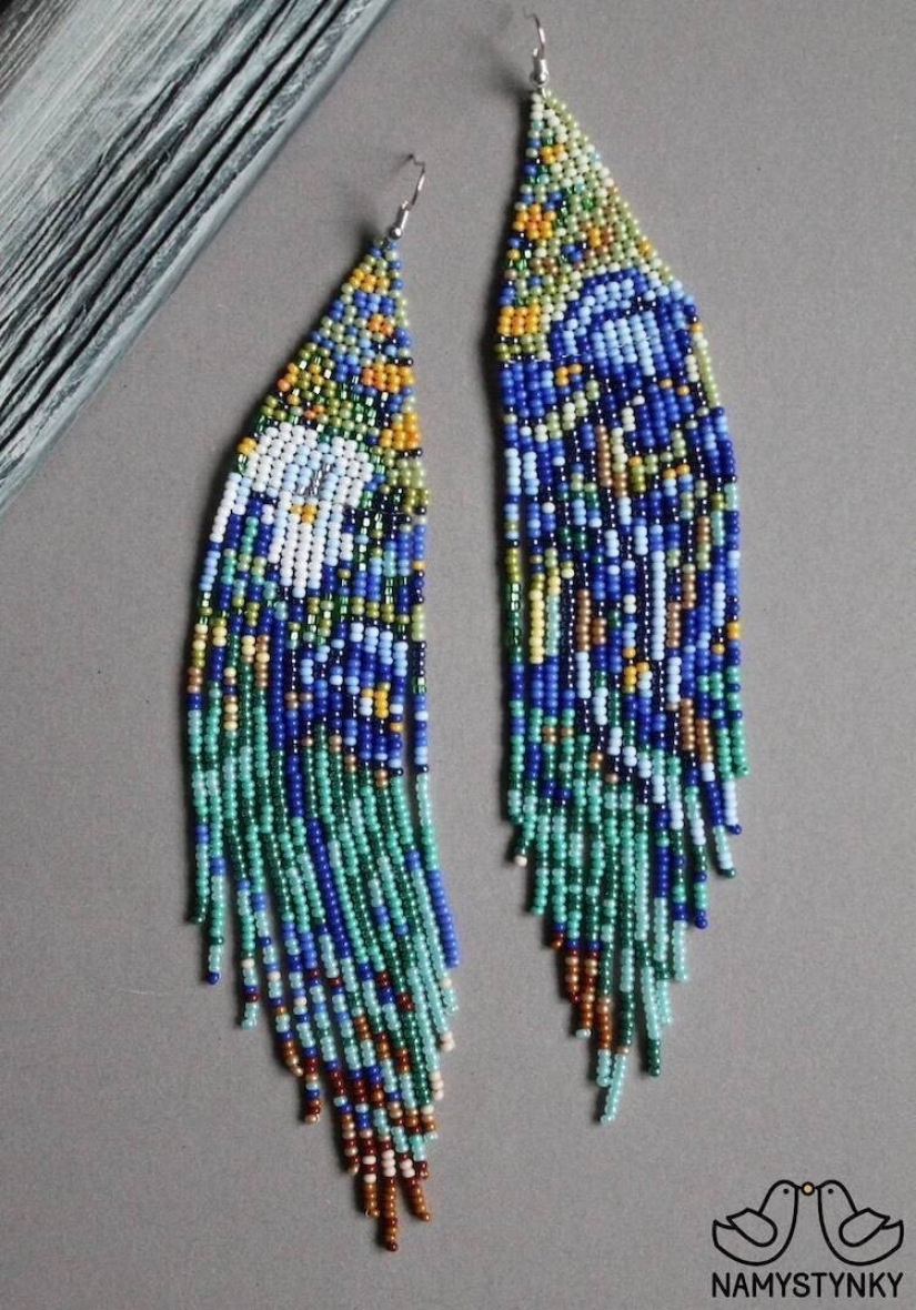 A talented Ukrainian woman makes beaded earrings based on the plots of famous paintings