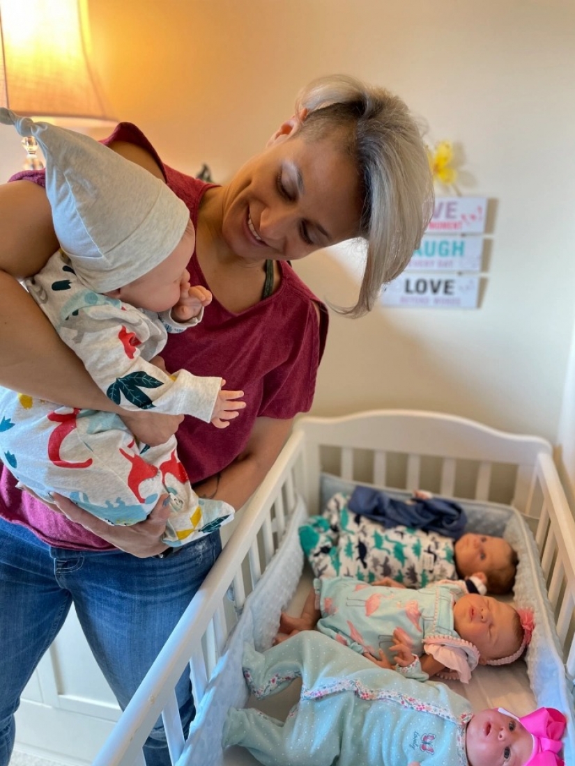American woman takes care of realistic babies to drown out the pain of parting with her own children American woman takes care of realistic babies to drown out the pain of parting with her own children