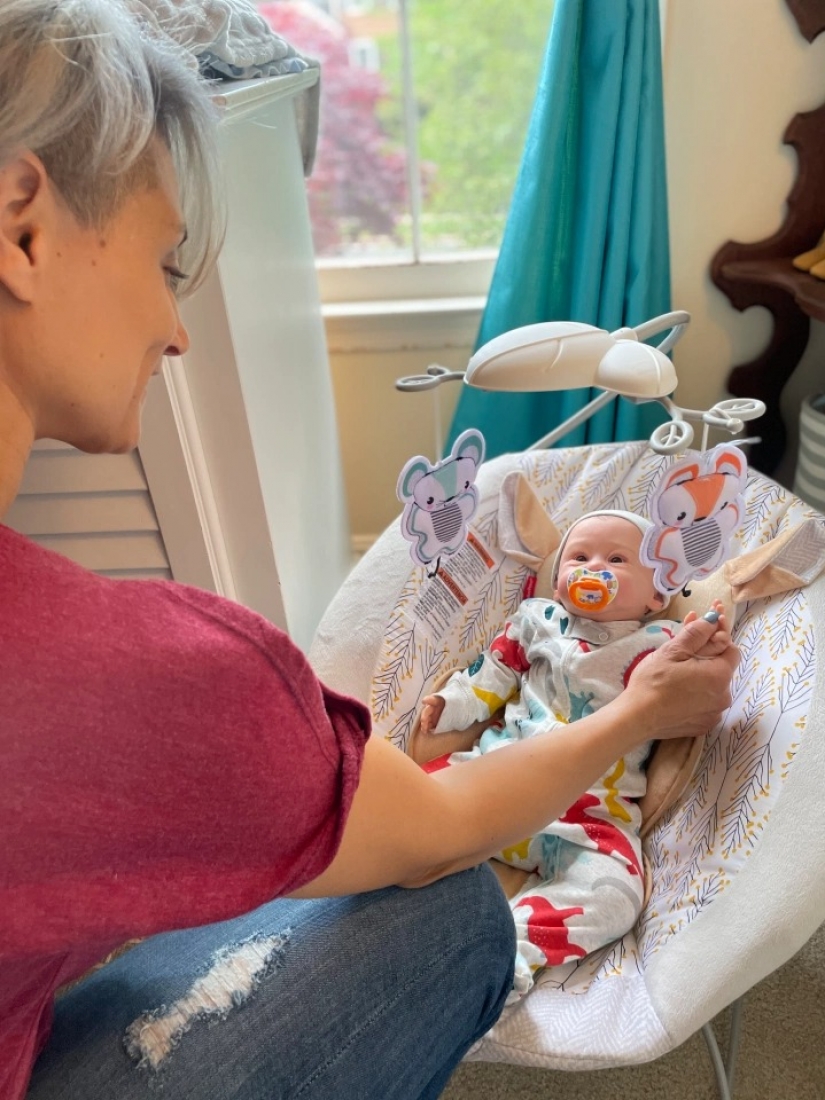 American woman takes care of realistic babies to drown out the pain of parting with her own children American woman takes care of realistic babies to drown out the pain of parting with her own children