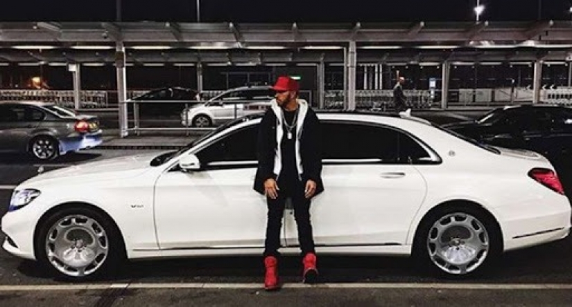 Cool guy on cool cars: a chic collection of cars of the racer Lewis Hamilton