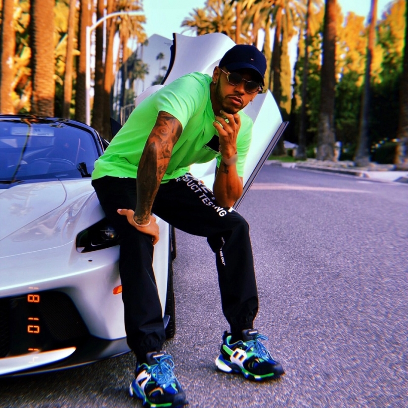 Cool guy on cool cars: a chic collection of cars of the racer Lewis Hamilton