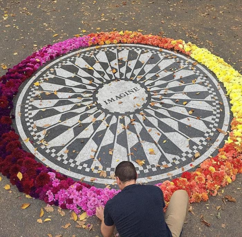 Crime or art? Someone is turning New York City trash cans into giant vases of flowers.