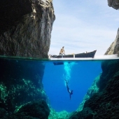 Having turned an old grandmother's van into a mobile home, the guy travels around the world