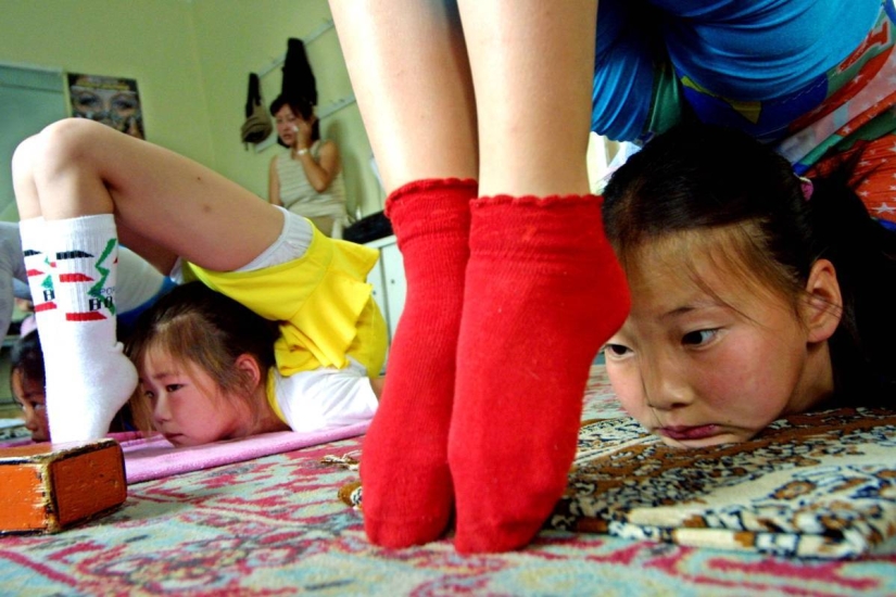 Mongolian girls are taken from their family to turn into famous acrobats Mongolian girls are taken from their family to turn into famous acrobats