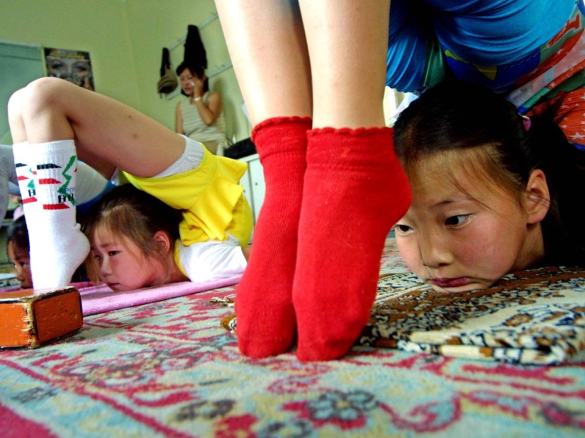 Mongolian girls are taken from their family to turn into famous acrobats Mongolian girls are taken from their family to turn into famous acrobats