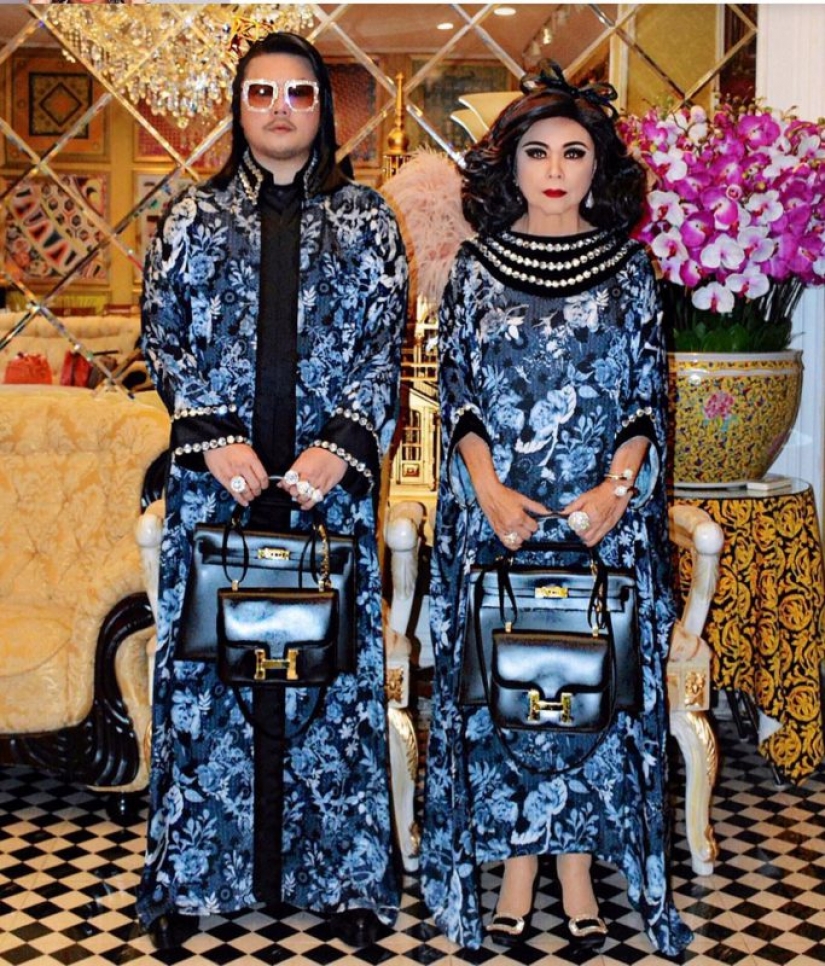 On the same page: mother and son from Thailand wear the same outfits