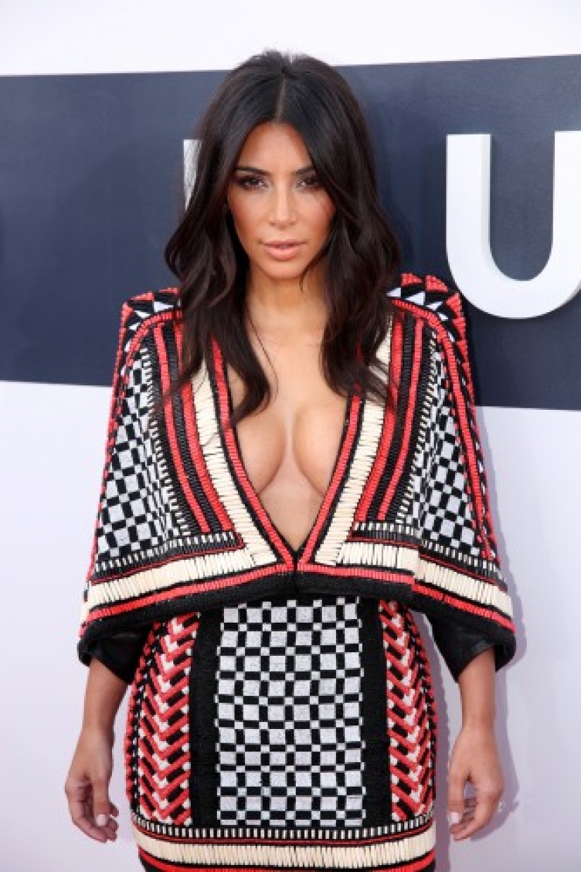 On the verge of a foul: The 15 most revealing cleavage of Kim Kardashian On the verge of a foul: The 15 most revealing cleavage of Kim Kardashian