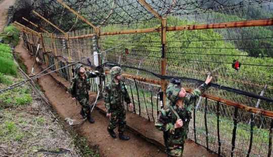 Salto a la libertad: una gimnasta de Corea del Norte saltó por encima de una valla de tres metros en Corea del Sur Salto a la libertad: una gimnasta de Corea del Norte saltó por encima de una valla de tres metros en Corea del Sur