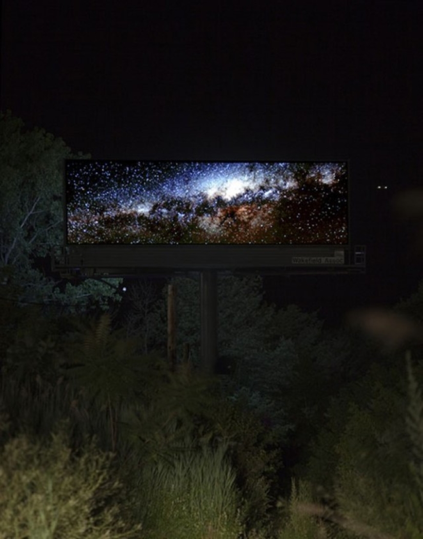 The artist bought a huge billboard to show the beauty of nature