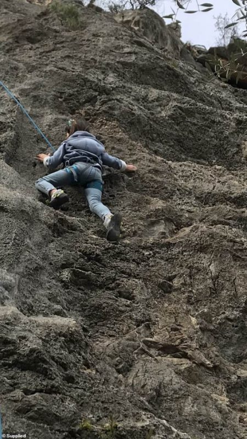 The cool kid: a seven-year-old biker rides a motorcycle with her mother, who loves extreme sports