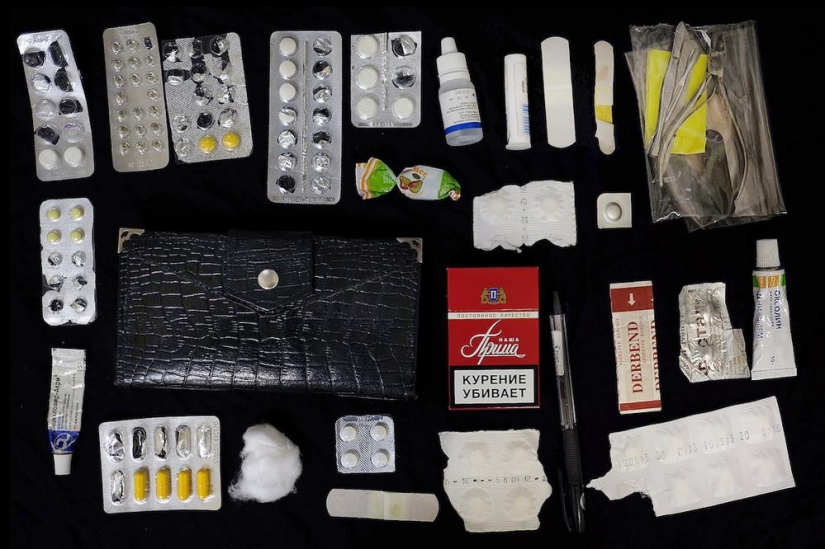 What is stored in women's handbags?