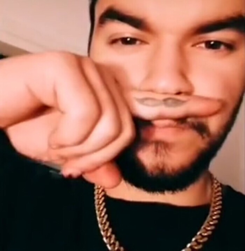 25 of the lucky winners in the competition for the stupid tattoo