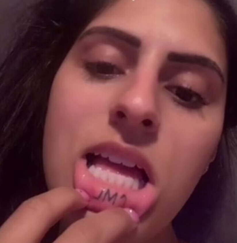 25 of the lucky winners in the competition for the stupid tattoo