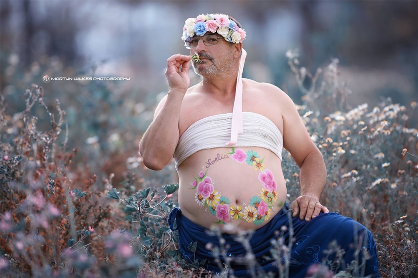 A father of two children with a "beer belly" staged a parody of a typical pregnant photo shoot