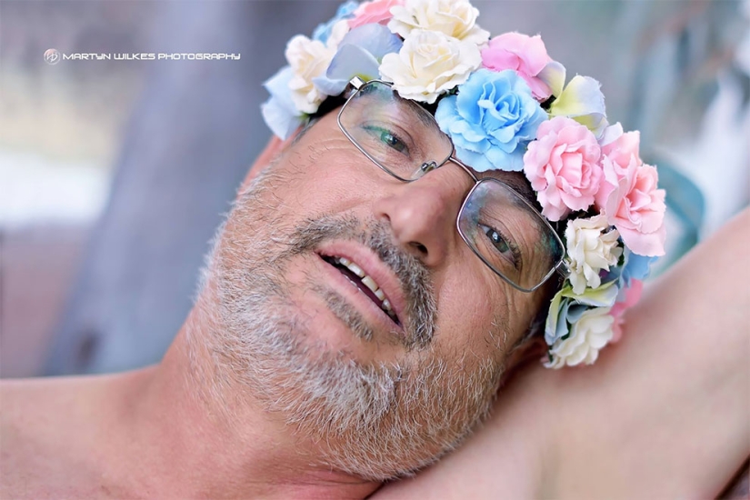 A father of two children with a "beer belly" staged a parody of a typical pregnant photo shoot