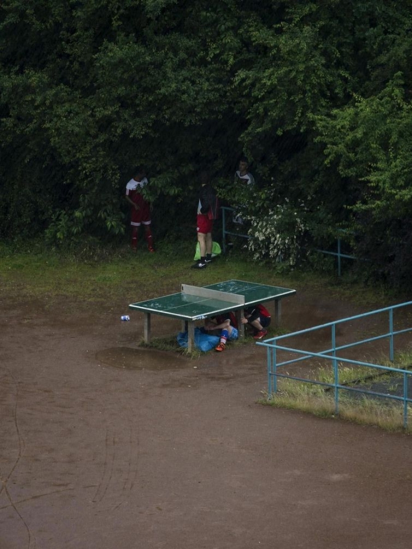 A Japanese man has been photographing a tennis table for five years, and people don't need it for ping-pong at all A Japanese man has been photographing a tennis table for five years, and people don't need it for ping-pong at all
