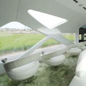 A new luxury train with two-story compartments and panoramic windows has been launched in Japan