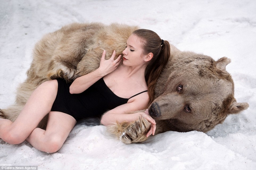 A snowy photo shoot of two models from Russia in an embrace with a bear shocked Europe A snowy photo shoot of two models from Russia in an embrace with a bear shocked Europe