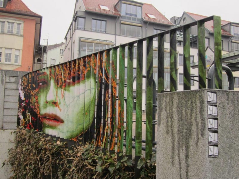 Arte callejero en la barandilla