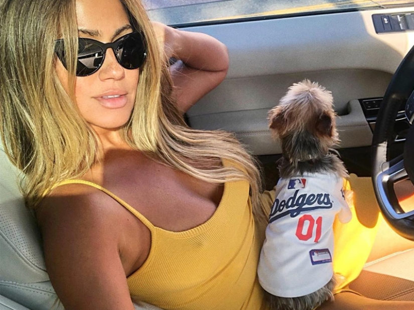 Beautiful girls and their four-legged friends: 25 photos