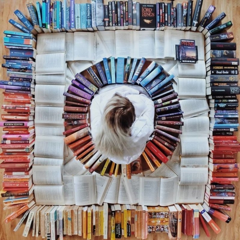 Books as art: a girl puts out colorful installations from her library