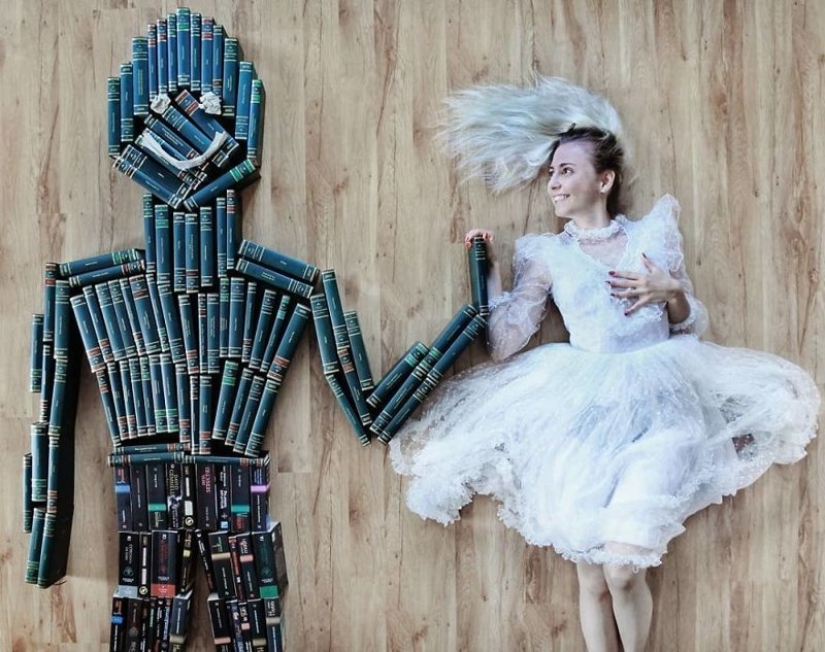 Books as art: a girl puts out colorful installations from her library