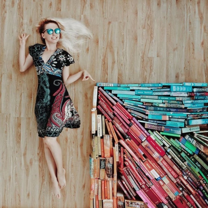 Books as art: a girl puts out colorful installations from her library