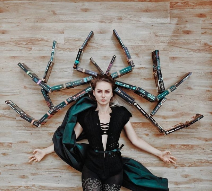 Books as art: a girl puts out colorful installations from her library