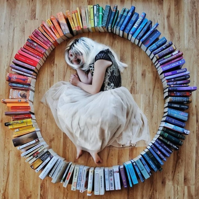 Books as art: a girl puts out colorful installations from her library