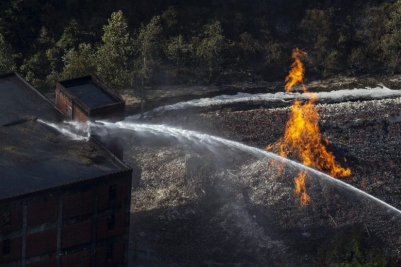 Bourbon in rivers and ethanol in the air: Jim Beam whiskey warehouses burn in Kentucky