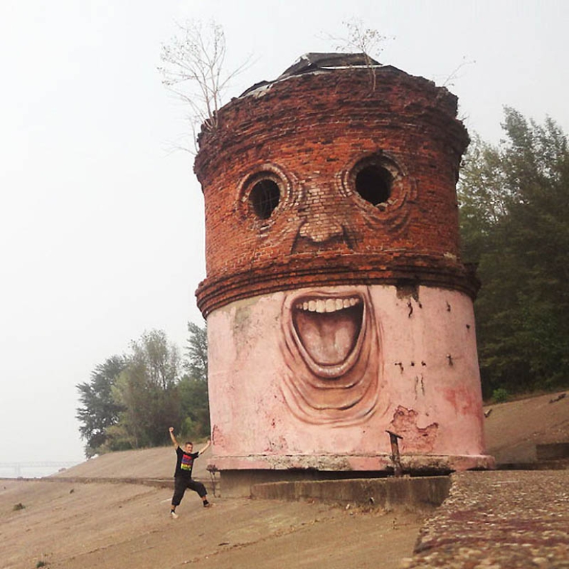Caras en edificios por Nikita Nomerz