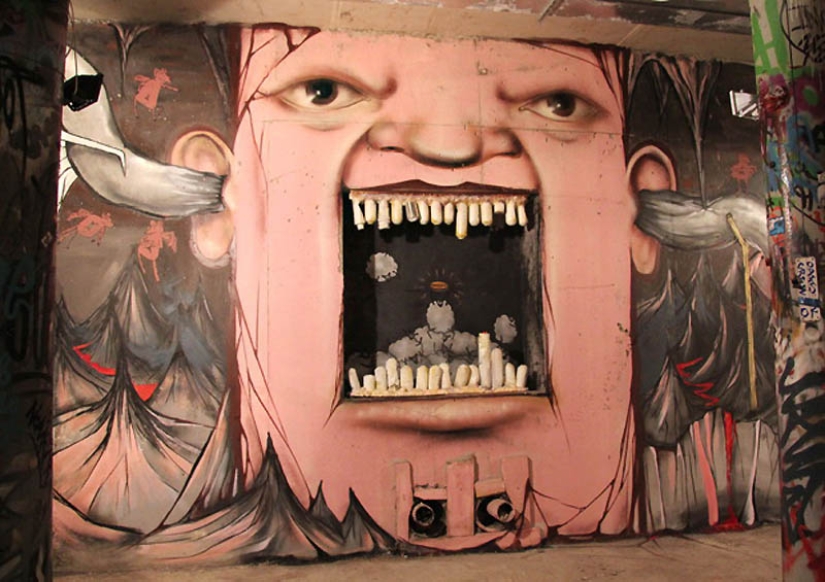 Caras en edificios por Nikita Nomerz